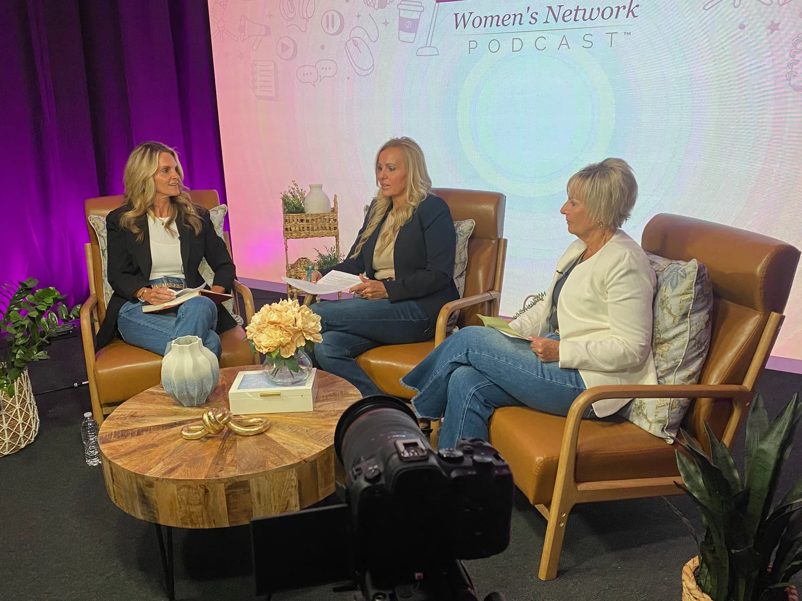Michele Morley in conversation with two guests on the YES! Women's Network Podcast set